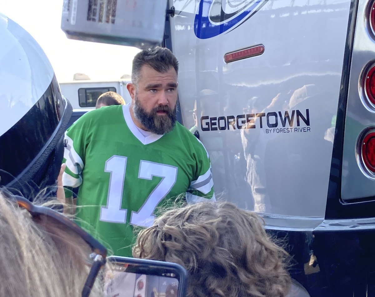 Retired Philadelphia Eagles center Jason Kelce waits to suprise fans at an impromptu appearance at a pregame tailgate party of an NFL football game between the Philadelphia Eagles and the Cleveland Br ...
