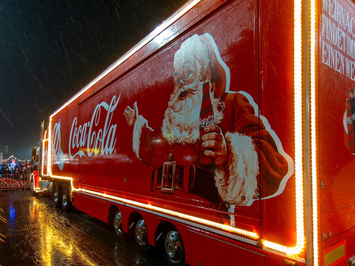 Neulengbach, Austria - December 1, 2023: new year and Christmas truck at the night public event xkwx happy merry party claus drink holiday red old december santa coca cola tradition celebration eve co ...