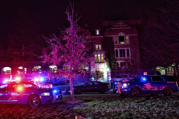 Police stage outside the Michigan State University Union off Abbot Road on Monday, Feb. 13, 2023, in East Lansing, Mich. Police urged frightened students and others to shelter in place as they searche ...