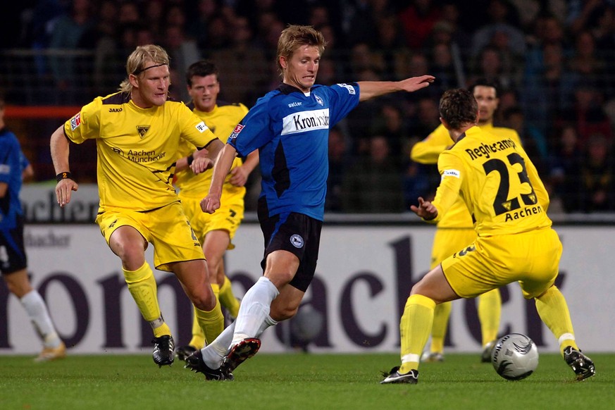Im Jahr 2006 hieß Mittelmäßigkeit in der Bundesliga noch Arminia Bielefeld gegen Alemannia Aachen. Artur Wichniarek (M.), Laurentiu Aurelian Reghecampf (r.) und Sascha Rösler – lasst euch die (Vereins-)Namen einfach mal auf der Zunge zergehen. 
