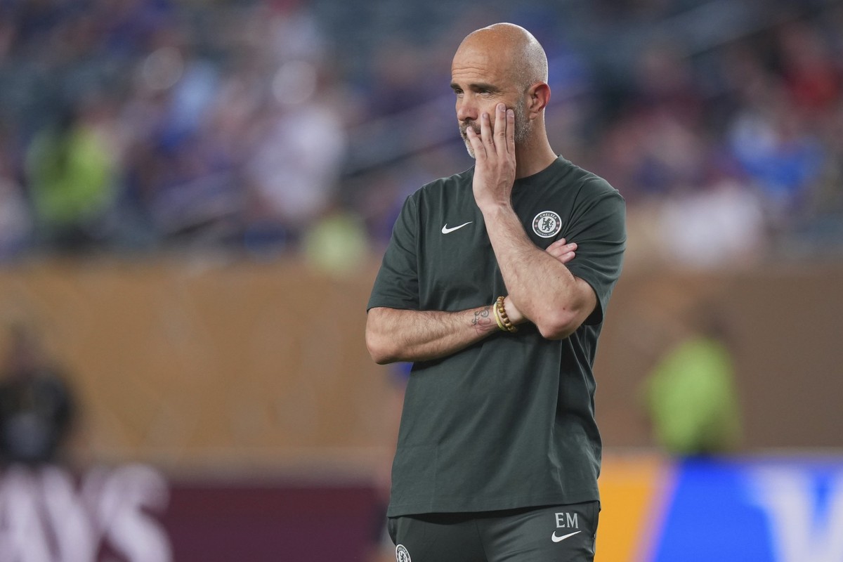 Chelsea manager Enzo Maresca looks on before the Club World Cup Group D soccer match between Esperance Tunisie and Chelsea in Philadelphia, Tuesday, June 24, 2025. (AP Photo/Chris Szagola)