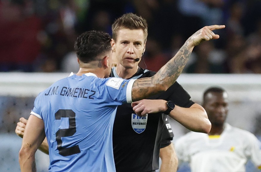 Josema Gimenez of Uruguay reacts against German referee Daniel Siebert after the FIFA World Cup, WM, Weltmeisterschaft, Fussball soccer match of the group phase between Ghana and Uruguay at Al-Janoub  ...