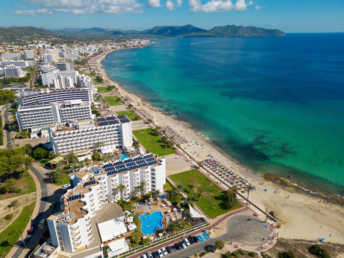 Aerial view from drone of Mediterranean Sea in Cala Millor during sunny day, Mallorca, Spain Model Released Property Released xkwx Calla Millor Mallorca Spain Mediterranean Sea seascape shoreline sunn ...