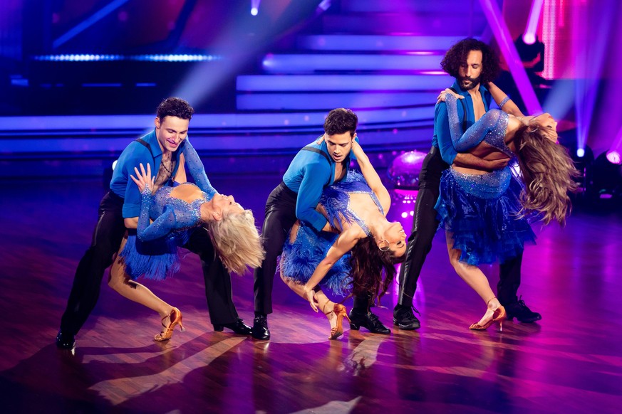 COLOGNE, GERMANY - FEBRUARY 21: Loiza Lamers, Ulrike von der Groeben and Luca Haenni perform together with their professional dance partners on stage during the pre-show &quot;Wer tanzt mit wem? Die g ...