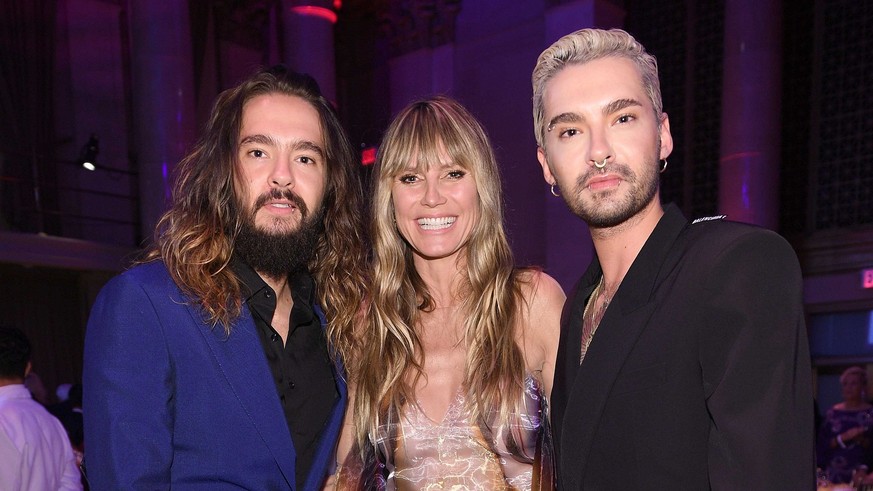 NEW YORK, NEW YORK - OCTOBER 28: (L-R) Tom Kaulitz, Heidi Klum and Bill Kaulitz attend the Angel Ball 2019 hosted by Gabrielle&#039;s Angel Foundation at Cipriani Wall Street on October 28, 2019 in Ne ...