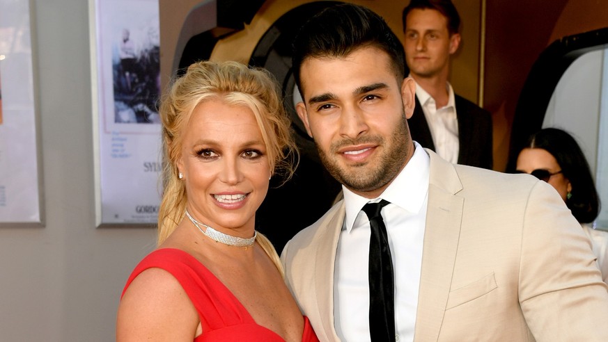 HOLLYWOOD, CALIFORNIA - JULY 22: Britney Spears (L) and Sam Asghari arrive at the premiere of Sony Pictures&#039; &quot;One Upon A Time...In Hollywood&quot; at the Chinese Theatre on July 22, 2019 in  ...