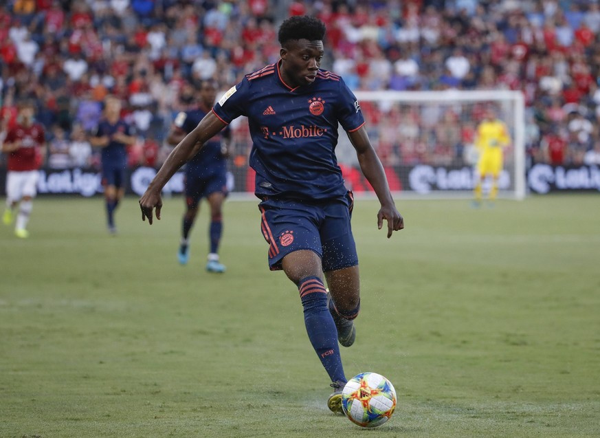 Bayern Munich midfielder Alphonso Davies controls the ball against the AC Milan during the first half of the International Champions Cup game at Children s Mercy Park on July 23, 2019 in Kansas City.  ...