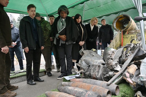 U.S. Ambassador to the United Nations Linda Thomas-Greenfield, center, looks at explosive ammunition as she visits the Forensic Center of Ukrainian Ministry of Internal Affair, Tuesday, Nov. 8, 2022 i ...