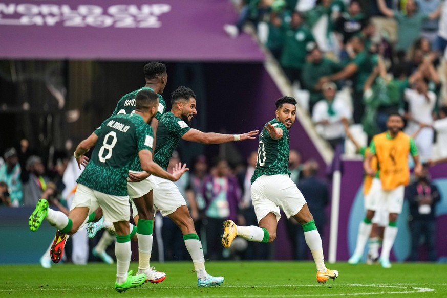 Argentina v Saudi Arabia: Group C - FIFA World Cup, WM, Weltmeisterschaft, Fussball Qatar 2022 10 SALEM ALDAWSARI of Saudi Arabia team celebrate with teammate after score second goal during the FIFA W ...