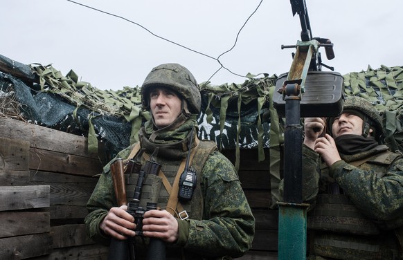 Pro-Russian Servicemen on the observation post watching for a Ukrainian drone on positions of the people&#039;s militia of the Donetsk People&#039;s Republic, Donbas, Ukraine on February 10, 2022. Rus ...