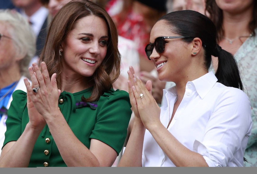 Kate Middleton (Duchess of Cambridge) and Meghan Markle (Duchess of Sussex), Pippa Middleton watch the Ladies Singles Final between Serena Williams and Simona Halep at The Wimbledon Championships tenn ...