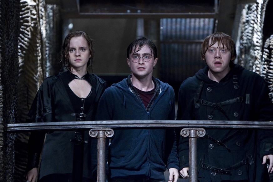 HARRY POTTER AND THE DEATHLY HALLOWS: PART 2, from left: Emma Watson, Daniel Radcliffe, Rupert Grint, 2011. ph: Jaap Buitendijk/ 2011 Warner Bros. Ent. Harry Potter publishing rights J.K.R. Harry Pott ...