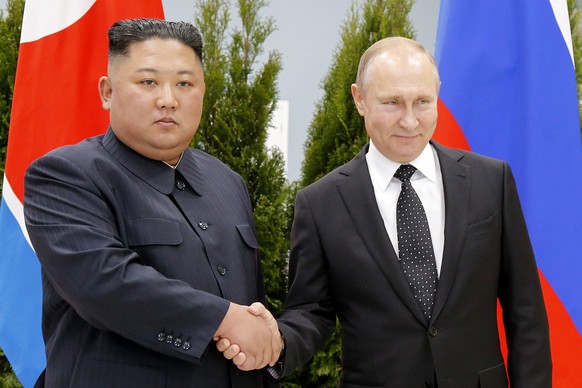FILE - Russian President Vladimir Putin, right, and North Korea&#039;s leader Kim Jong Un shake hands during their meeting in Vladivostok, Russia, Thursday, April 25, 2019. A North Korean train presum ...