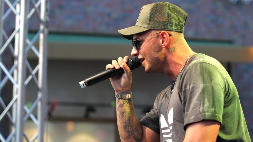 SOLTAU, GERMANY - AUGUST 03: Pietro Lombardi performs at the Late Night Shopping at Designer Outlet Soltau on August 3, 2018 in Soltau, Germany. (Photo by Mathis Wienand/Getty Images for Designer Outl ...