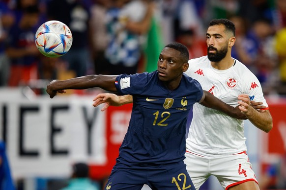 Tunisia vs France DOHA, CA - 30.11.2022: TUNISIA VS FRANCE - KOLO MUANI Randal of France and MERIAH Yassine of Tunisia during a match between Tunisia and France, valid for the group stage of the World ...