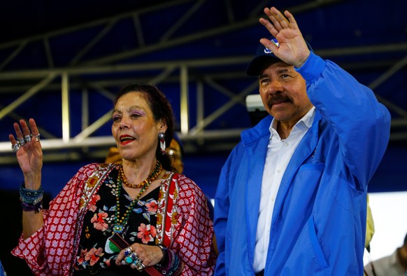 Nicaragua&#039;s President Daniel Ortega and Vice-President Rosario Murillo wave to supporters during celebrations to mark the 39th anniversary of the &quot;Repliegue&quot; (Withdrawal) in Managua, Ni ...