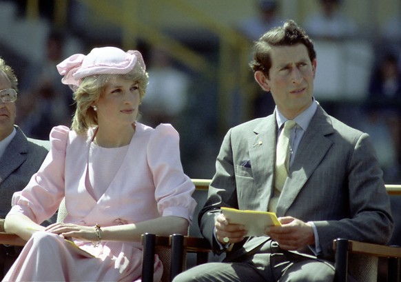 NEWCASTLE, AUSTRALIA - 1983: Princess Diana And Prince Charles watch an official event during their first royal Australian tour 1983 IN Newcastle, Austrlia. (Photo by Patrick Riviere/Getty Images)