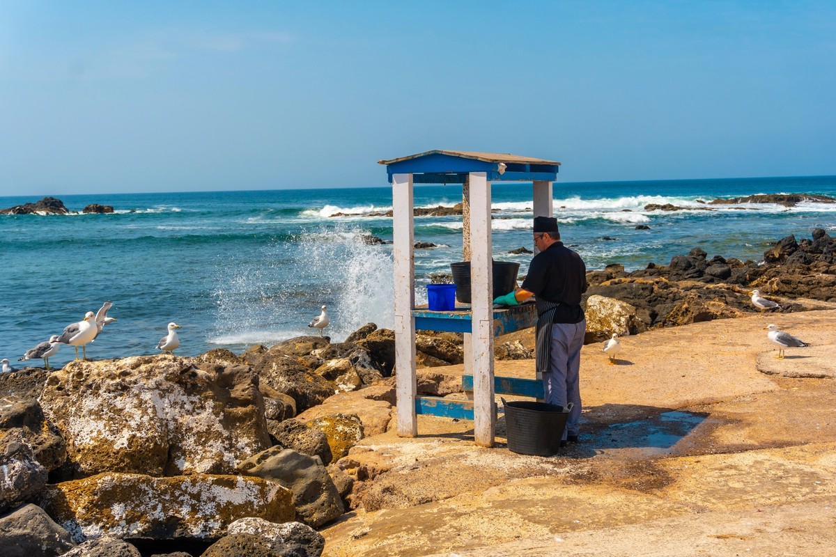 A fish cutter from a restaurant in the tourist town of El Cotillo in the north of the island of Fuerteventura, Canary Islands. Spain