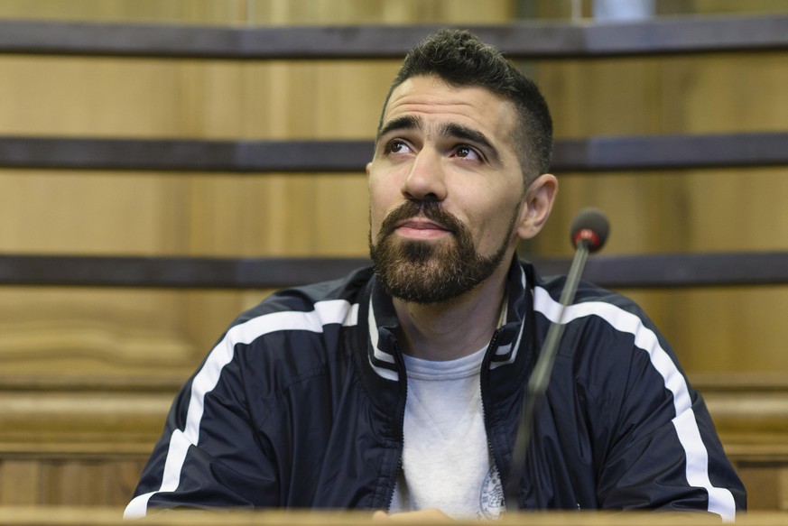 BERLIN, GERMANY - FEBRUARY 20: The rap musician Bushido (Anis Mohamed Youssef Ferchichi) waits at the Kriminalgericht Moabit before an assault hearing on February 20, 2014 in Berlin, Germany. Bushido  ...