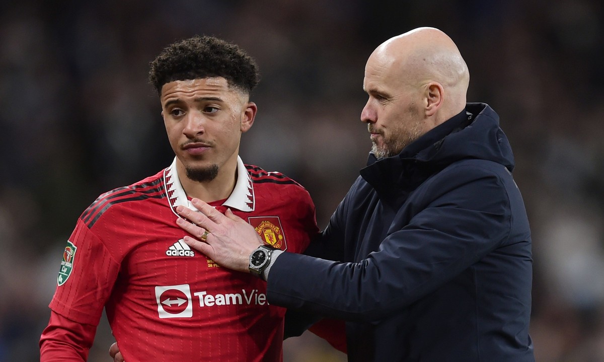 Mandatory Credit: Photo by MICAH CROOK/PPAUK/Shutterstock 13780624ez Erik Ten Haag, Manager of Manchester United, ManU embraces Jadon Sancho of Manchester United after the EFL Carabao Cup Final match  ...