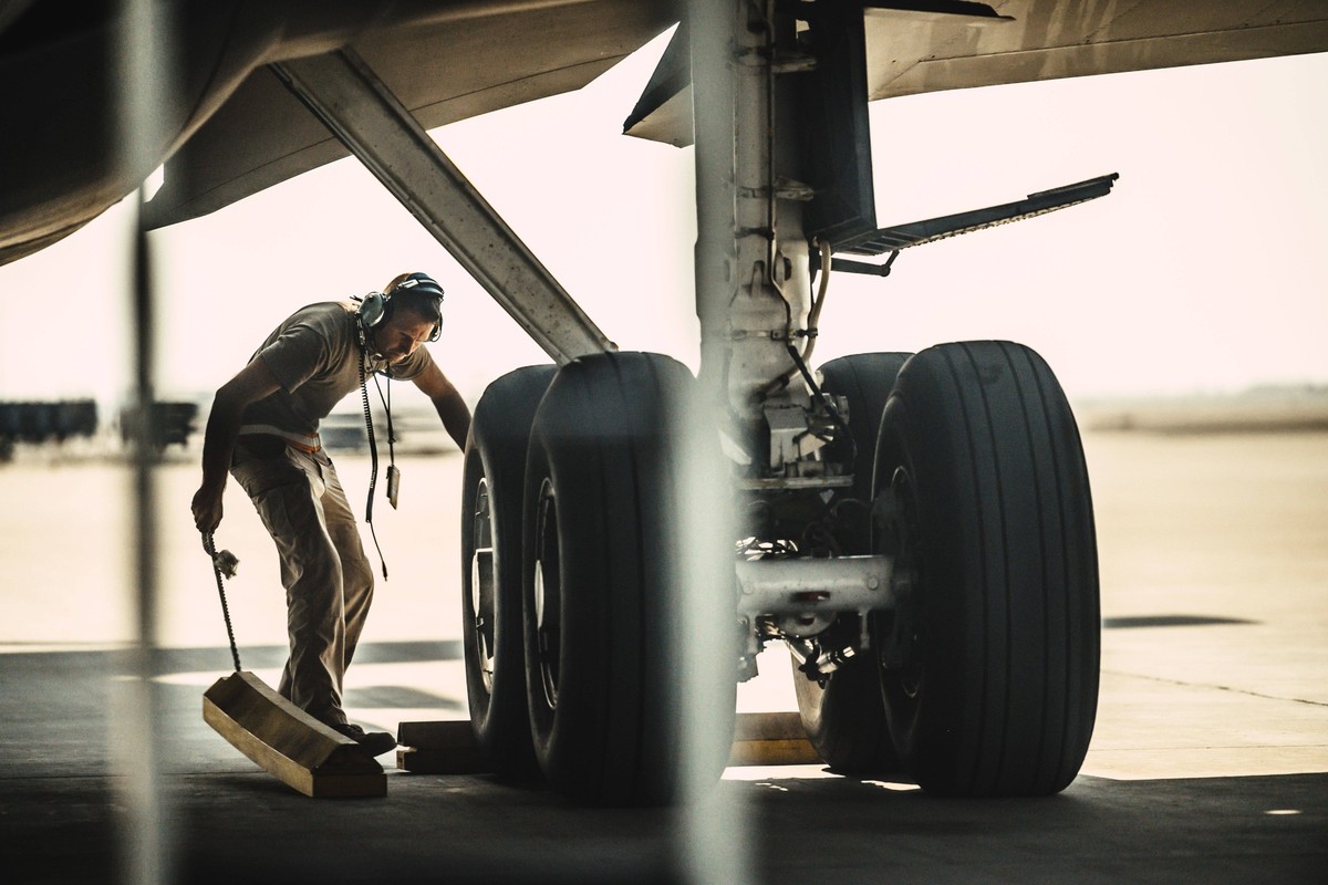 November 18, 2020 - Qatar - U.S. Air Force Staff Sgt. Alexander Kelly, a crew chief with the 379th Expeditionary Air Maintenance Squadron, removes chalks before launching a KC-135 Stratotanker at Al U ...