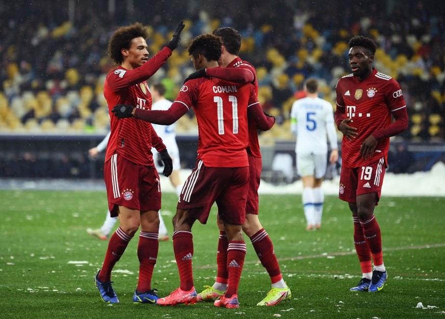 KYIV, UKRAINE - NOVEMBER 23: Kingsley Coman of FC Bayern Muenchen celebrates after scoring their side&#039;s second goal with Leroy Sane during the UEFA Champions League group E match between Dinamo K ...