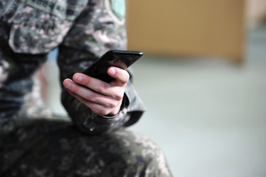South Korean Army Soldier Using Smartphones.