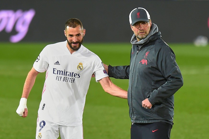 Mandatory Credit: Photo by Bagu Blanco/BPI/Shutterstock 11846651eg Liverpool FC manager J�rgen Klopp greets Karim Benzema of Real Madrid at full time Real Madrid v Liverpool, UEFA Champions League Qua ...