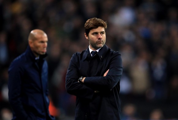 Tottenham Hotspur v Real Madrid - UEFA Champions League - Group H - Wembley Stadium. Tottenham Hotspur manager Mauricio Pochettino (right) and Real Madrid manager Zinedine Zidane (left) during the UEF ...