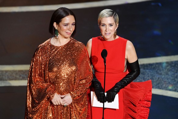 HOLLYWOOD, CALIFORNIA - FEBRUARY 09: (L-R) Maya Rudolph and Kristen Wiig speak onstage during the 92nd Annual Academy Awards at Dolby Theatre on February 09, 2020 in Hollywood, California. (Photo by K ...