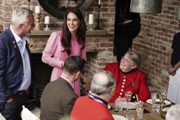 Britain&#039;s Kate, Princess of Wales speaks with the Chelsea Pensioners, after taking part in the first Children&#039;s Picnic at the RHS Chelsea Flower Show, at the Royal Hospital Chelsea, London,  ...