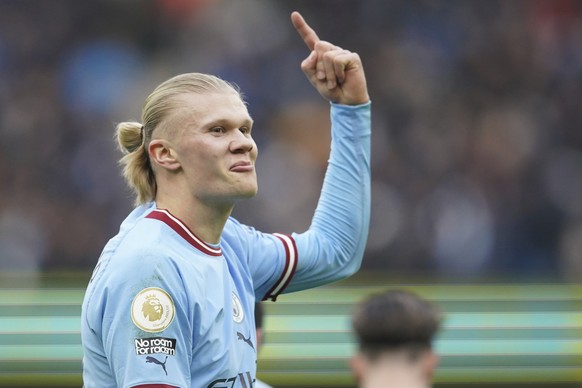 Manchester City's Erling Haaland celebrates after scoring his side's opening goal during the English Premier League soccer match between Manchester City and Wolverhampton at the Etihad Stadium in Manc ...