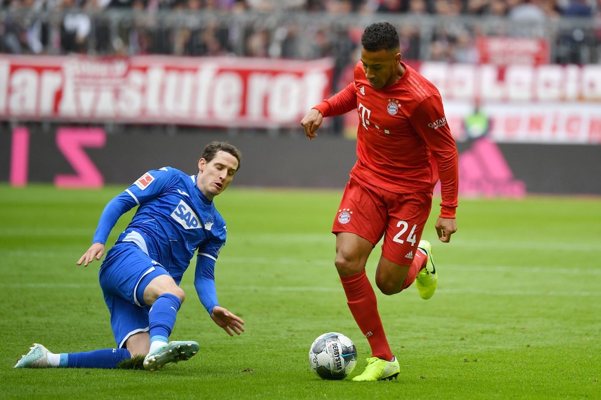 v.li:Sebastian RUDY 1899 Hoffenheim, Aktion,Zweikampf gegen Corentin TOLISSO Bayern Muenchen. Fussball 1. Bundesliga,7.Spieltag,Spieltag07, FC Bayern Muenchen M - TSG 1899 Hoffenheim 1-2, am 05.10.201 ...