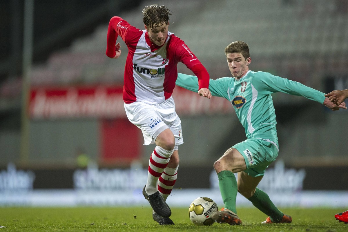 (L-R)Wout Weghorst of FC Emmen,Robin Gosens of FC Dordrecht during the Jupiler League match between FC Emmen and FC Dordrecht at the FC Emmen stadium on february 7, 2014 in Emmen, The Netherlands FC E ...