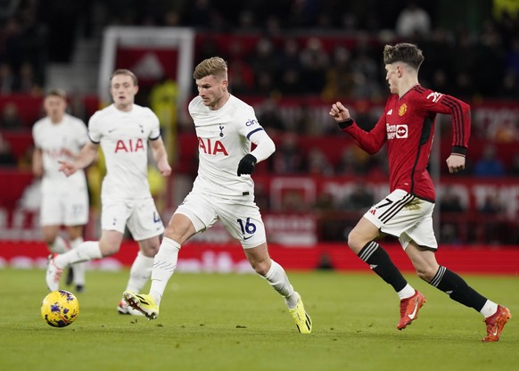 Sport Bilder des Tages Manchester, England, 14th January 2024. Timo Werner of Tottenham runs ahead of Alejandro Garnacho of Manchester United, ManU during the Premier League match at Old Trafford, Man ...