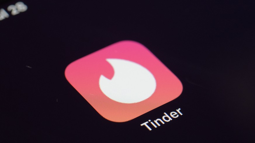 FILE - This July 28, 2020, file photo shows the icon for the Tinder dating app on a device in New York. According to a new study released Tuesday, Oct. 5, 2021, by Pew Research Center, the share of th ...