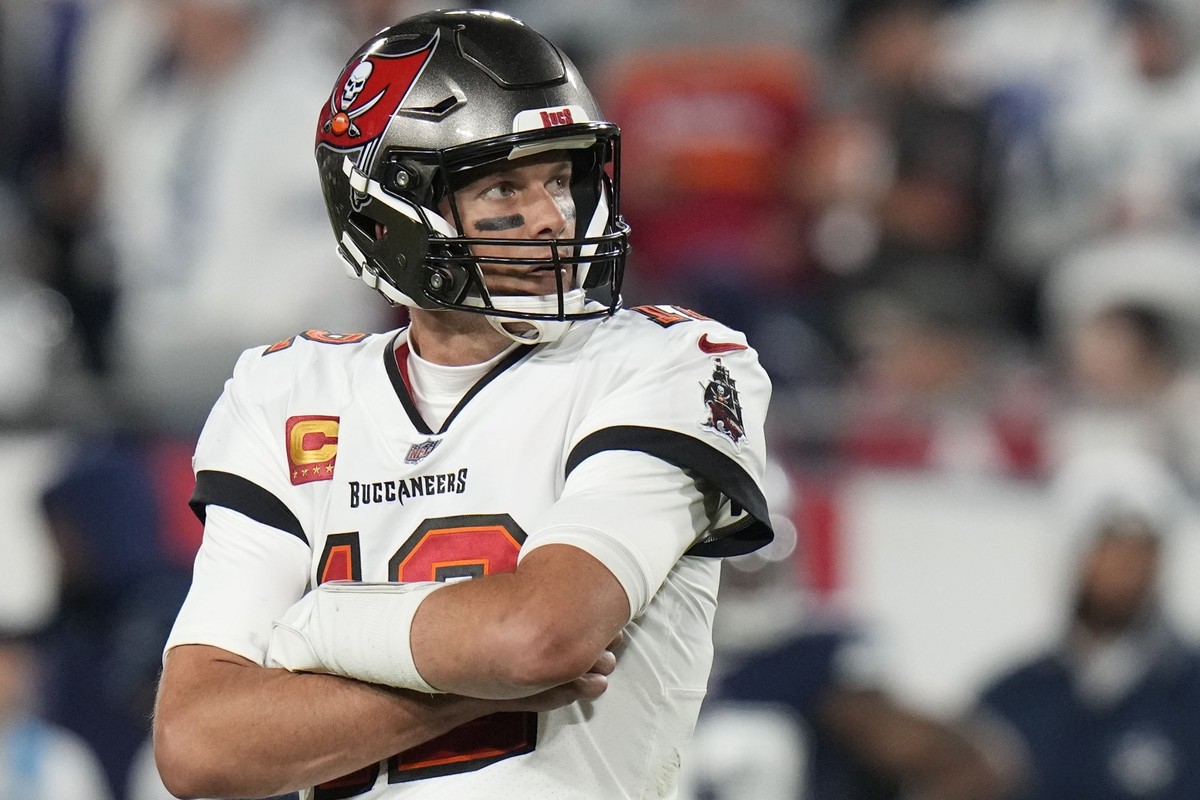 Tampa Bay Buccaneers quarterback Tom Brady (12) stands on the field during the second half of an NFL wild-card football game against the Dallas Cowboys, Monday, Jan. 16, 2023, in Tampa, Fla. (AP Photo ...