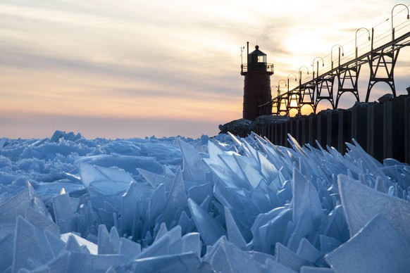 Shards of ice pile up on Lake Michigan along the South Haven Pier in South Haven, Mich., on Tuesday, March 19, 2019. (Joel Bissell/Kalamazoo Gazette via AP)
