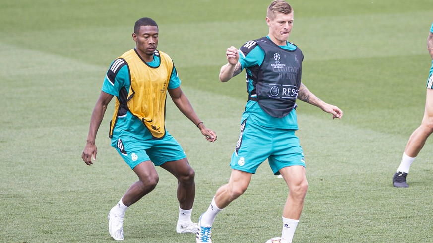 24.05.2022, Madrid, Spain. Toni Kroos of Real Madrid CF R is chased by David Alaba of Real Madrid CF L during open media day Real Madrid at Ciudad deportiva Real Madrid on 24 Mal 2022 in Madrid Spain. ...
