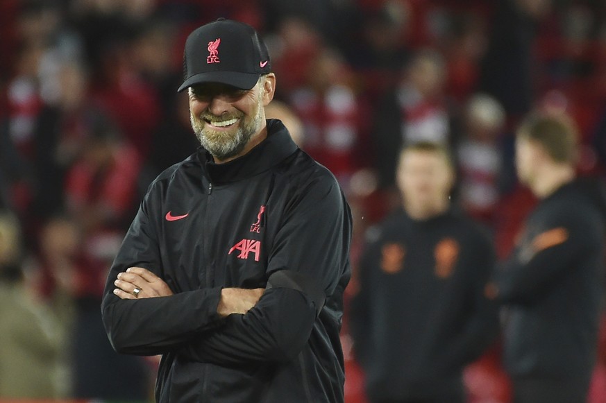 Liverpool&#039;s manager Jurgen Klopp smiles before the Champions League Group A soccer match between Liverpool and Rangers at Anfield stadium in Liverpool, England, Tuesday Oct. 4, 2022. (AP Photo/Ru ...