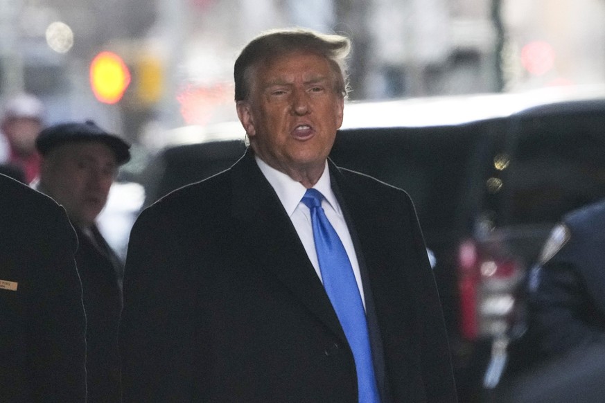 FILE - Former President Donald Trump leaves his apartment building in New York, Monday, Jan. 22, 2024. On Friday, Jan. 26, The Associated Press reported on stories circulating online incorrectly claim ...