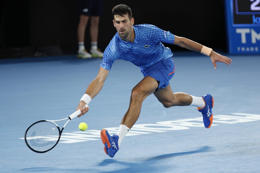 Novak Djokovic of Serbia plays a forehand to Stefanos Tsitsipas of Greece during the men&#039;s singles final at the Australian Open tennis championships in Melbourne, Australia, Sunday, Jan. 29, 2023 ...