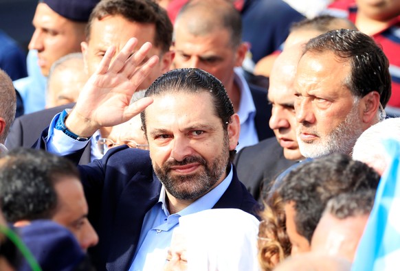 Lebanese Prime Minister and a candidate for parliamentary elections Saad al-Hariri, gestures during a campaign rally in Sidon, Lebanon May 2, 2018. REUTERS/Ali Hashisho