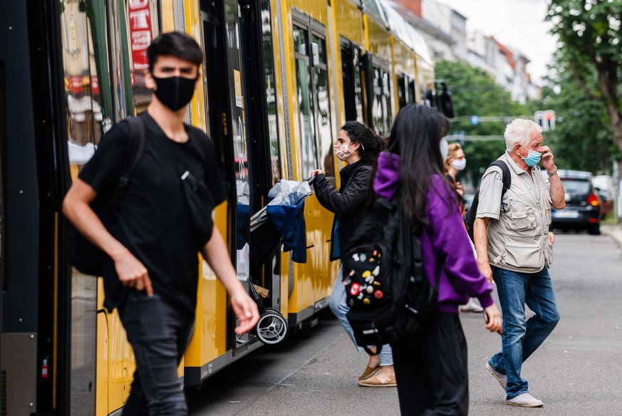 200717 -- BERLIN, July 17, 2020 Xinhua -- Passengers wearing face masks are seen by a tram in Berlin, capital of Germany, July 16, 2020. The number of confirmed COVID-19 infections in Germany now stan ...