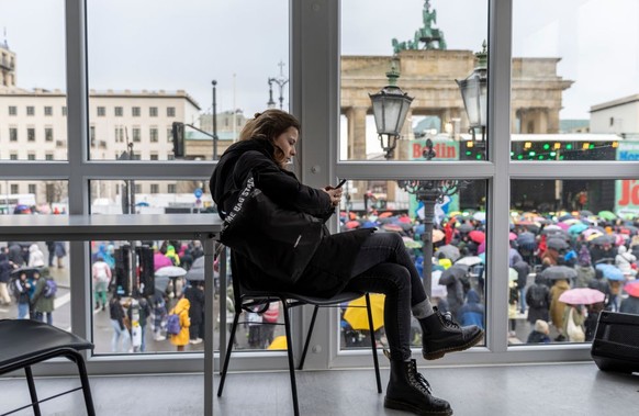 BERLIN, GERMANY - MARCH 25: Luisa Neubauer, prominent member of the Fridays for Future climate action movement waits in a room as people gather for a demonstration and concert in support of tomorrow&# ...