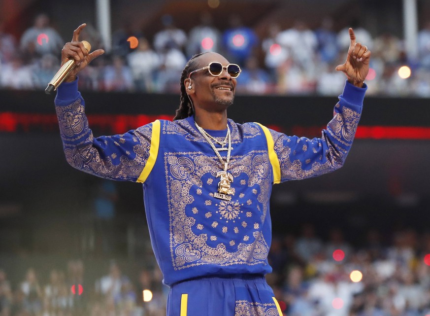 American rapper Snoop Dogg performs in the Pepsi Super Bowl LVI Halftime Show during Super Bowl LVI between the Cincinnati Bengals and Los Angeles Rams at SoFi Stadium in Los Angeles on Sunday, Februa ...