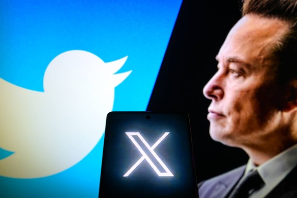 July 24, 2023, Ahmedabad, Gujarat, India: In this photo illustration, the twitter s new logo seen displayed on a smartphone. Elon Musk has officially changed Twitter s logo from the iconic blue bird t ...