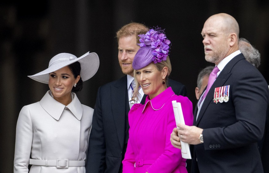 Prince Harry and Meghan, Duchess of Sussex, Zara Phillips and Mike Tindall leave at the St Pauls Cathedral in London, on June 03, 2022, after attended the Service for The National Service of Thanksgiv ...
