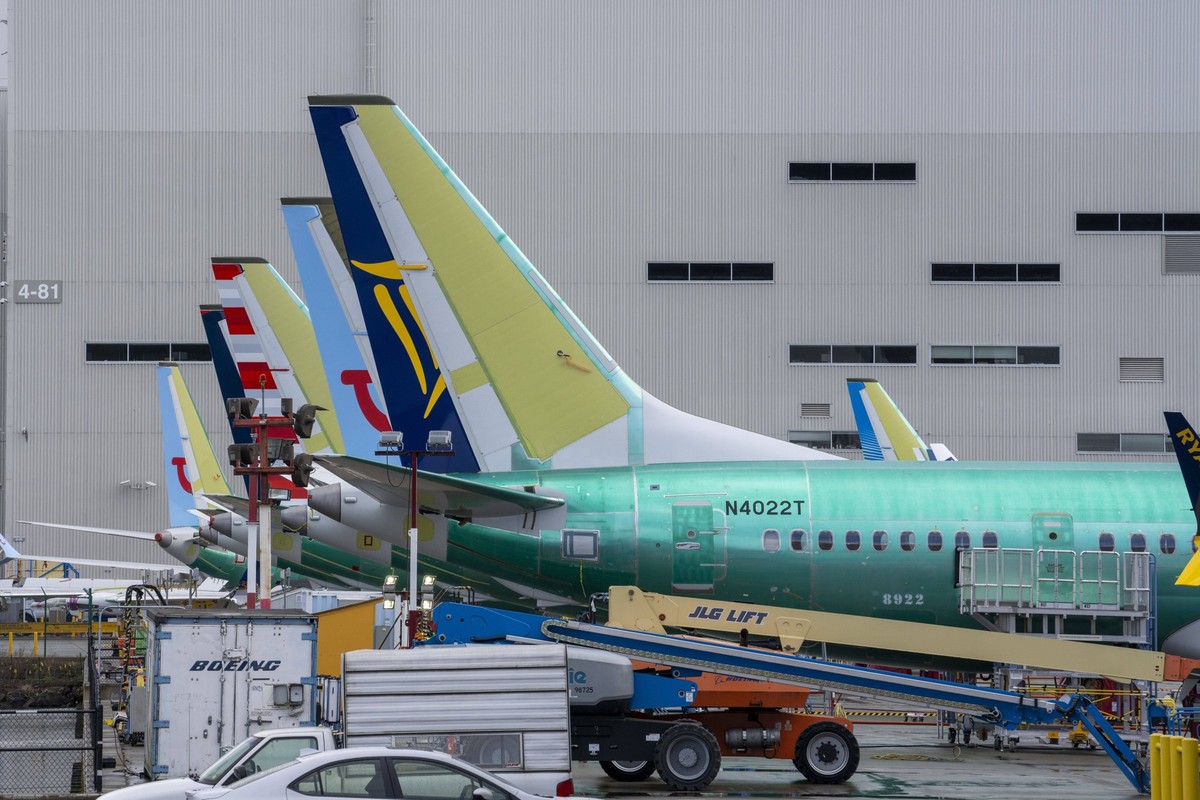 March 12, 2024, Renton, Washington, USA: Boeing airplanes in various stages of maintenance stand at the edge of the runway of Renton Municipal Airport near the Boeing Renton Factory, Tuesday. The Boei ...