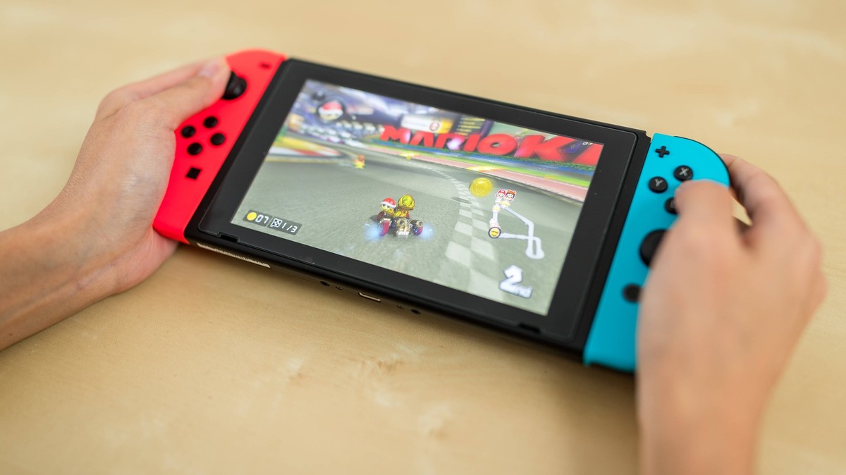 Hong Kong, 15 June 2017 -: Playing mario kart , 25066980.jpg, nintendo, switch, game, device, gaming, console, entertainment, controller, home, young, fun, lifestyle, technology, leisure, computer, pl ...